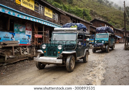 CHIN STATE, MYANMAR - JUNE 23 2015: Trucks in village popular for selling apples in the recently opened to foreigners area of Chin State - western Myanmar (Burma)