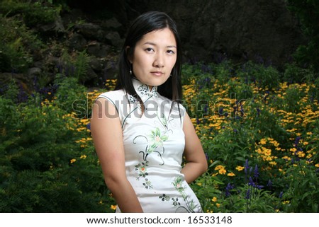 Portrait of Traditional Chinese Girl in an Authentic Chinese Dress
