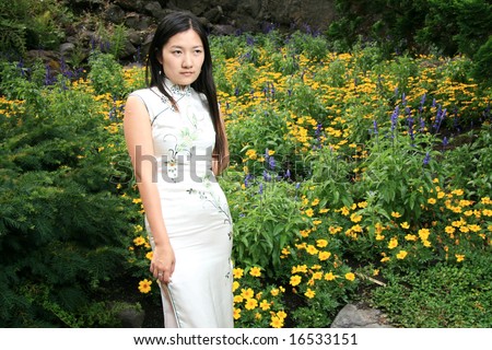 Portrait of Traditional Chinese Girl in an Authentic Chinese Dress