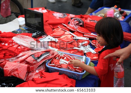 BANGKOK - NOV 19: At least 10,000 Red Shirts anti-government protesters return to Bangkok\'s streets to mark 6 month anniversary of a deadly military crackdown on Nov 19, 2010 in Bangkok.