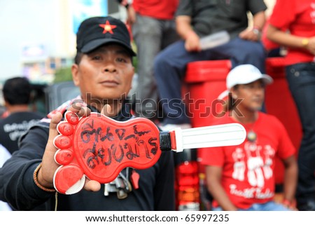 BANGKOK, THAILAND - NOV 19: Red Shirts - At least 10,000 anti-government protesters return to Bangkok\'s streets to mark the 6 month anniversary of a deadly military crackdown on November 19, 2010 in Bangkok