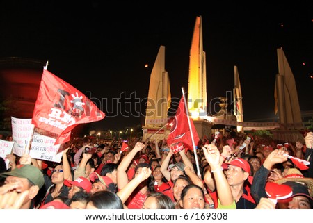 BANGKOK - DEC 10: Red Shirts - At least 10,000 anti-government protesters return to the streets of Bangkok\'s at Democracy Monument to make themselves heard on December 10, 2010 in Bangkok