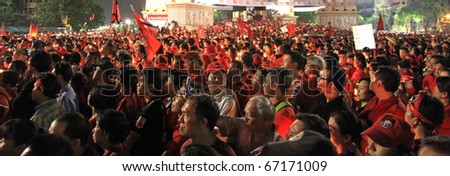 BANGKOK - DEC 10: Red Shirts - At least 10,000 anti-government protesters return to the streets of Bangkok\'s at Democracy Monument to make themselves heard on December 10, 2010 in Bangkok