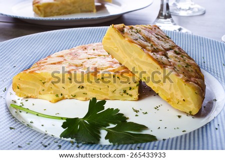 Spanish omelette with potatoes and onion, typical Spanish cuisine / Tortilla espanola