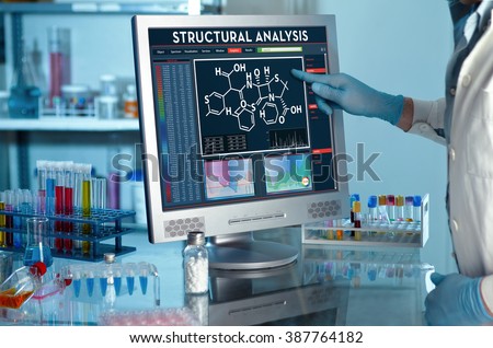 analyzing data scientist in the laboratory with a screen project development / researcher touching the screen of report of structural analysis
