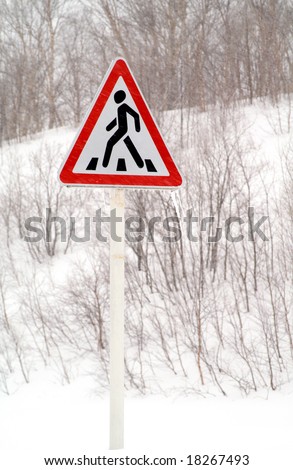 traffic sign  covered by snow, concept of bad weather
