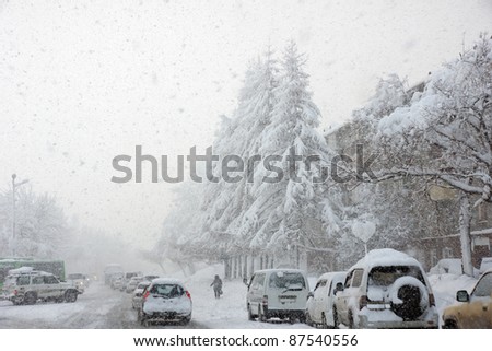 snowstorm, poor visibility,slick roads and lots of traffic