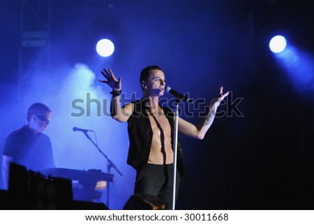 TEL AVIV, ISRAEL – MAY 10 : English electronic music band perform on stage during their ‘Tour of the Universe’ tour May 10, 2009 in Tel Aviv, Israel.