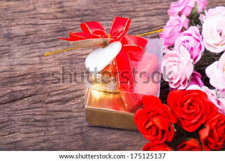 Valentine decoration, heart shaped chocolates box with blank card and bow decorated with roses