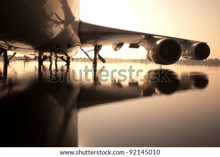 Airplane over water in the Thailand flooding at Donmaung International Airport.