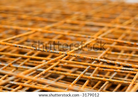 Rusty iron net for ferro-concrete. Selective focus