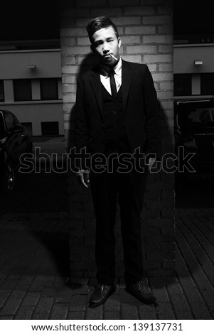 Cool Asian guy posing in black and white