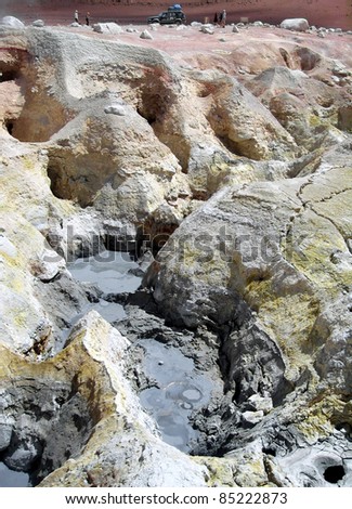 Bolivia\'s Altiplano geyser mud pools. At nearly 4900 meters, the Morning Sun geysers have zinc, sulfur and other gases and metals painting the landscape and giving it a typical rotten eggs smell.