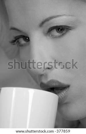 coffee drinker sipping on the rim
