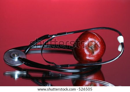 an apple a day keeps the dr. away Stethoscope and apple