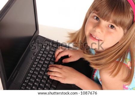 close up of girl studying on her computer laptop learning more about things