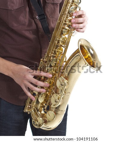 Closeup of a man wearing brown shirt is playing the saxophone, only the instrument, hands and part of the man\'s body are shown - isolated on white