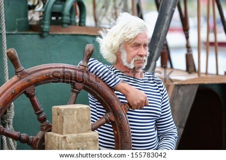 Portrait of a ship captain with gray hair