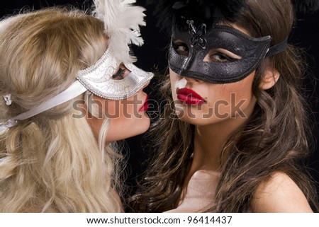 Cute girls in masquerade mask
