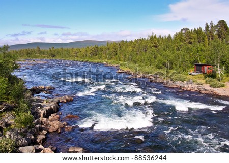clear upland river near to polar circle - Norway