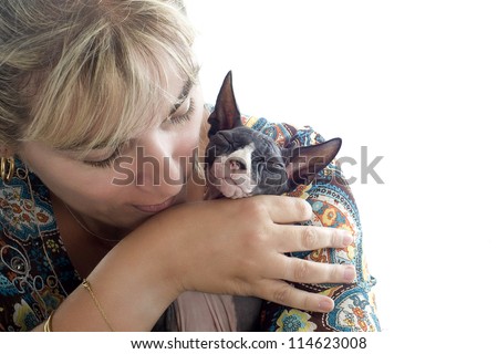 beautiful purebred sphynx cat and his owner in front of white background