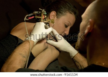woman tattoo artist
