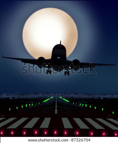 airplane taking off from runway at night