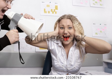 Office scene. Boss is screaming on secretary