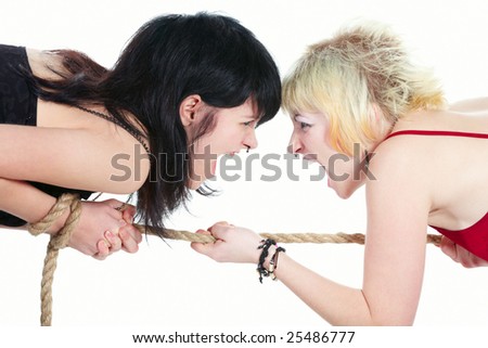 stock-photo-tag-of-war-between-brunette-and-blonde-full-isolated-25486777.jpg