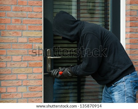 Burglar carrying the tool of choice
