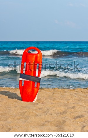 red buoy for a lifeguard to save people from drowning
