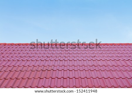 Red roof and blue sky
