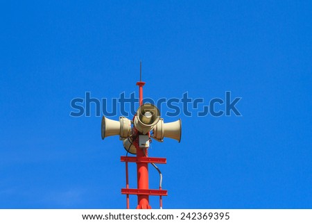 Horn speaker for public announcement and blue sky background