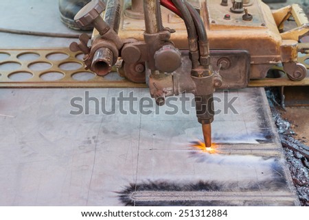 Gas cutting machine on steel plate