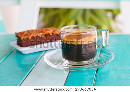 Coffee cup on white blue table