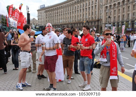 KIEV, UKRAINE - JUNE 15: Football fans from England have fun in Fan-Zone of Euro 2012 on June 15, 2012 in Kiev, Ukraine. The Ukrainian host cities are Lviv, Donetsk, Kharkiv and Kiev.