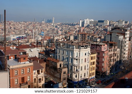 ISTANBUL, TURKEY - DEC 27: Istanbul streets from top at sunny day on December 27, 2012 in Istanbul. With a population of 13.5 million, Istanbul forms one of the largest urban agglomerations in Europe.