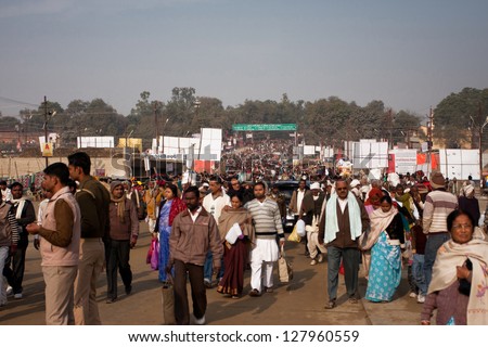 ALLAHABAD, INDIA - JANUARY 27: People movement on the way to holy Sangam during the biggest festival in the world - Kumbh Mela on January 27 2013 in Allahabad, India