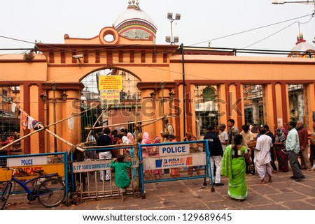 KOLKATA, INDIA - JAN 15: Line of people going to Kalighat Kali Temple for celebration Ganga Sagar Mela on January 15, 2013 in Kolkata. The name Calcutta to have been derived from the word Kalighat