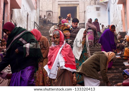 AYODHYA, INDIA - JAN 27: Visitors of the Hanuman Garhi Temple go down the stairs at cold morning on January 27, 2013 in Ayodhya, India. The temple was built by the Nawab of Avadh in 10th century