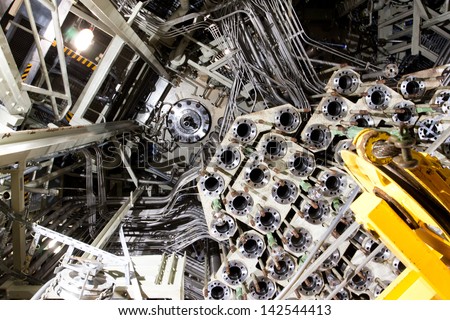 ZWENTENDORF, AUSTRIA - JUNE 1: Steel pipelines, valves, wires and cables inside Industrial zone of the Nuclear Power Plant on June 1, 2013. The plant has a boiling-water reactor rated at 692 megawatts