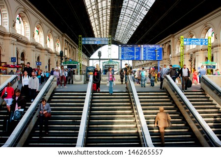 Budapest - May 29: Passengers On The Stairs Of Main Building Of Keleti Railway Station On 29 May 2013 In Budapest, Hungary. The Main International Railway Terminal In Budapest Was Constructed In 1884