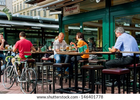 Vienna - June 6: People Have Lunch In A Restaurant Of The Famous Area Of The Market Naschmarkt On June 6, 2013 In Vienna, Austria. The Popular Naschmarkt Has Existed Since The 16th Century.