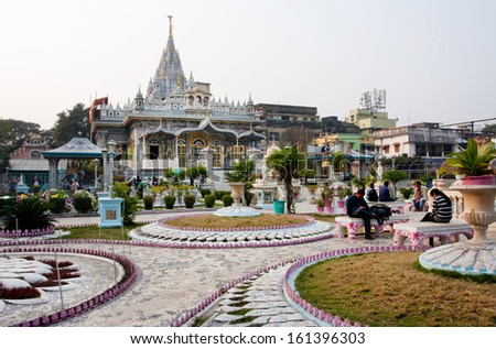KOLKATA, INDIA - JAN 12: Visitors in the courtyard of Sheetalnathji Jain temple on January 12 2012 in Kolkata India. Temple founded in 1867 & erected in 1910. Jainism is India\'s sixth-largest religion