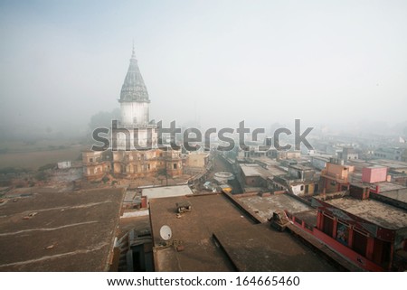 AYODHYA, INDIA - JAN 27: High dome of historical hindu temple at morning fog on January 27, 2013 in Uttar Pradesh, India. Ayodhya is an ancient city, birthplace of Lord Rama, who was born in 5114 BCE