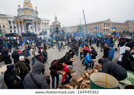 KIEV, UKRAINE - NOV 28: Angry people occupide main Maidan square and ask the corrupt government to sign the documents of Accession to the European Union on November 28, 2013 in Kiev