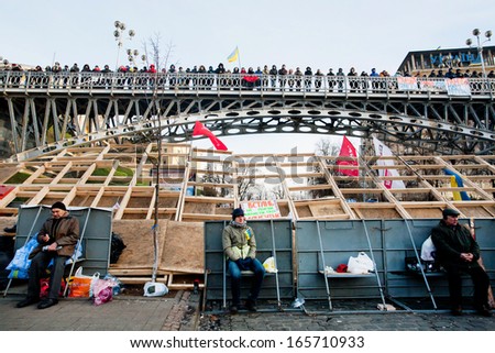 KYIV, UKRAINE - DEC 2: Many people on the city bridge and by barricades meet on anti-government demonstration during the week of pro-European protest on December 2, 2013 in Kiev, Ukraine