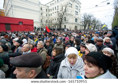 KYIV, UKRAINE - DEC 1: Faces of angry demonstrators in the crowd of 800 thousands people walking to anti-government meeting during the week of pro-European protest on December 1, 2013 in Kiev, Ukraine