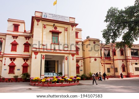 VARANASI, INDIA - JAN 6: People come from central office of Bannares Hindu University on January 6, 2013. The University is one of the largest residential universities in Asia with 20,000 students