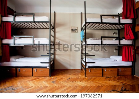 PRAGUE - MAY 14: Three-level dormitory beds inside the hostel room for six tourists or the students on May 14, 2014. Prague receives more than 4.4 million international visitors annually